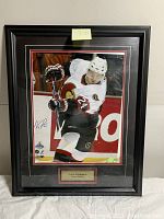 Full view of the signed framed photo of Anton Volchenkov in Ottawa Senators uniform.