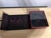 Spearhead VR Over-Ear Headphones in unopened original box with illustrated packaging opened beside it.