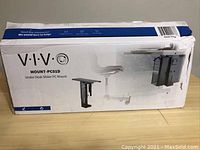 Box of VIVO MOUNT-PC01D Under Desk Slider PC Mount with product image and branding.