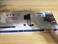 Original box showing VIVO branding and image of the black dual wall mount designed for Sonos speakers, labeled with MaxSold lot sticker.