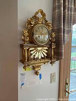 Full frontal view of clock mounted on wall