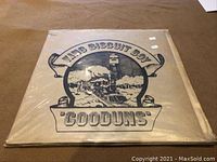 Front sleeve of King Biscuit Boy 'Gooduns' LP vinyl record showing black and white graphic with pig and train illustration.