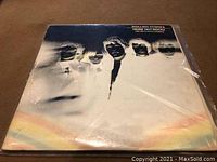 Front cover of The Rolling Stones "More Hot Rocks" LP showing inverted black-and-white photo of band members and album title sticker.