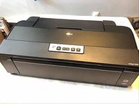 Front view of Epson Artisan 1430 printer showing overall shape and finish