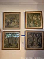 Four framed prints arranged on a wall showing the overall grouping and style of the lot.