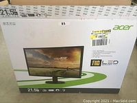 Closed box showing Acer 21.5 inch LED monitor branding, specifications including Full HD and LED technology.