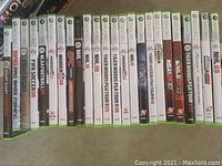 Photo showing 19 Xbox 360 sports games including Madden NFL, NBA 2K12, Tiger Woods PGA Tour, FIFA Soccer, NHL series, and others.