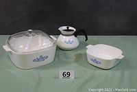 Full lot showing all three items: 4-quart square casserole with glass lid, 1-quart casserole without lid, and 4-cup teapot with handle