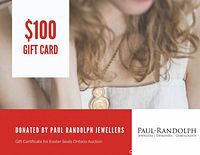 Image of a $100 gift card advertisement from Paul Randolph Jewellers showing a partial image of a woman and branding details.