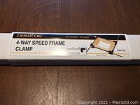 Packaging box showing Veritas brand and description 4-Way Speed Frame Clamp, with image of the clamp and dimensions.