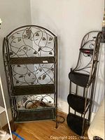First photo shows both metal shelving units side by side, the decorative grapevine design unit and the corner shelving unit.