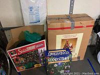 Boxed animated Santa figure and Christmas tree, with visible boxes