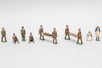 Full group of 8 lead toy soldiers and nurse figures from WWI era.