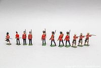 Overview of all 11 WWI English lead toy soldiers in various poses