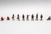 Full shot showing all 10 WWI English lead toy soldiers in various poses and uniforms.