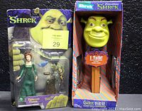 Photo showing Shrek Giant PEZ Candy Roll Dispenser in original box and Princess Fiona action figure in packaging