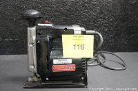Side view of Sears Craftsman Sabre Saw showing overall condition and attached power cord.