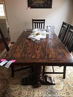 Full length view of tabletop showing plank construction and metal accents