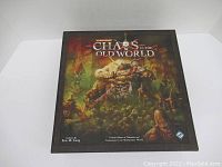 Front view of the Warhammer Chaos in the Old World game box, showing detailed cover art.
