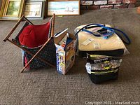 Pet supplies on carpet including the Shed Pal pet carrier, bird food, leashes, harness, and other items