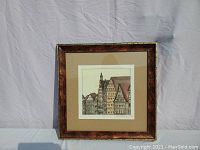 Front view of the framed and matted print showing the architectural artwork and frame details