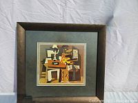 Front view of framed and matted Picasso Three Musicians print against a neutral background.