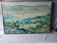 Full front view of the framed abstract landscape painting