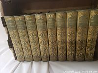 Photo of 11 hardcover books by Francis Parkman with gold embossed spines in cloth bindings, titles clearly visible.