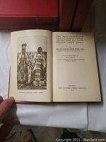 Photograph of title page and photo inside book's front pages showing the title 'The Wild Northland' by Gen. Sir William Francis Butler, printed 1911, Toronto.