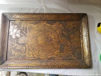 Top view of the wooden tray showing overall design and condition.