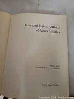 Title page showing book title 'Indian and Eskimo Artifacts of North America' by Charles Miles, Bonanza Books New York