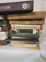 Stack of Canadian history books showing titles such as 'Loyal She Remains' and 'Lights on the St. Lawrence'