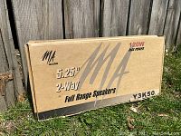 Photo of boxed MA Audio speakers showing brand, size, power ratings and model number Y3K50.