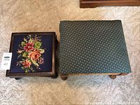 Top view of two vintage footstools side by side showcasing needlepoint floral and green fabric upholstery.