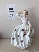 Full front view of Royal Doulton Maureen figurine showing overall design and floral details on dress.