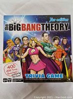 Box cover featuring cartoon characters from The Big Bang Theory dressed as superheroes with text '400 new trivia questions! Written by the fans' and official logo.