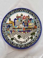 Top view showing detailed colorful Jerusalem cityscape and blue bordered design with 'JERUSALEM' text