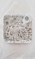 Full top view of the square ceramic plate showing the detailed map design of Hamburg city printed in black on white background.