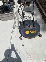 Top view of Ground Force surface cleaner head with handles and wheels