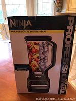 Front view of unopened Ninja Professional Blender 1000 box showing blender image and branding