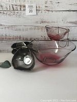 Front view of all items including ruby bottom chip and dip set with hook and three silver ombre bowls