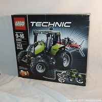 Front view of the unopened Lego Technic Model 9393 box showing the tractor model, age range 9-16, and total 353 pieces.