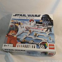 Closed box front showing Lego Star Wars Battle of Hoth set 3866. Shows box artwork including game board, figures, and Darth Vader graphic.