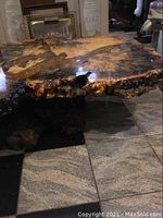 High-angle view of top surface showing live edge and burl grain patterns