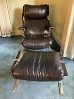 Front view of lounge chair with matching ottoman set