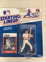 Close-up image of Wade Boggs figure and collector card in unopened blister pack.