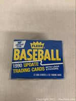 Single box of 1990 Fleer Baseball update trading cards with logo stickers, sealed unopened box.