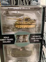Boxed die cast tank and combat figures with Sword Beach label and hand-painted detail in original packaging