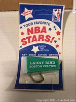 Single Larry Bird key chain action viewer in original packaging showing front packaging with NBA Stars branding, Larry Bird Boston Celtics text on viewer.