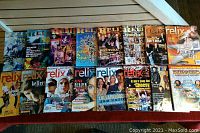 Spread of 25 assorted Relix and Dupree's Diamond News magazines laid out on a wooden floor showing colorful covers, various artists, and music related headlines.